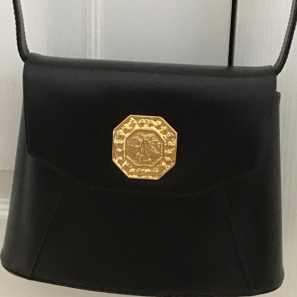 YSL Black Leather Handbag with YSL gold tone logo in the front - Picture 12 of 12